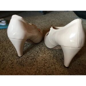 TWO pairs of Nude pinup style pumps. Cole Haan and the Temu pair